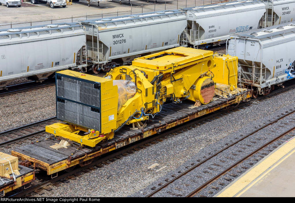 TTHX 97147, 60-ft flat car with Komatsu equipment load on BNSF